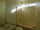 Simple bathroom with a bathtub and shower at 3886 Via Lucia Dr, Las Vegas, NV 89115