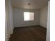 Well-lit bedroom featuring neutral colored carpet and a window with blinds at 3886 Via Lucia Dr, Las Vegas, NV 89115