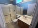 Bathroom with a shower, and neutral color palette at 4636 Ferrell St, North Las Vegas, NV 89031