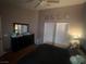 Bedroom featuring a ceiling fan, closet and furniture at 4636 Ferrell St, North Las Vegas, NV 89031