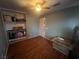 Bedroom featuring a ceiling fan, and unfinished shelving unit at 4636 Ferrell St, North Las Vegas, NV 89031