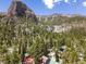 Aerial view of neighborhood nestled in a mountain valley at 4765 Silver Tip Trl, Mount Charleston, NV 89124