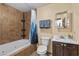 Bathroom with shower/tub combo, tile flooring, and vanity with dark wood cabinets at 4765 Silver Tip Trl, Mount Charleston, NV 89124