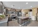 Modern kitchen with granite countertops, stainless steel appliances, and an island at 4823 Kinworthy St, North Las Vegas, NV 89081