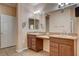 Double vanity bathroom with lots of counter space and storage at 5026 Vincitor St, Las Vegas, NV 89135