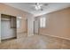 Bedroom with mirrored closet and tile floors at 5026 Vincitor St, Las Vegas, NV 89135