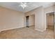 Bright bedroom with mirrored closet and tile floors at 5026 Vincitor St, Las Vegas, NV 89135