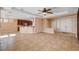 Open living space with views into kitchen and entryway at 5026 Vincitor St, Las Vegas, NV 89135