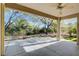 Covered patio with ceiling fan, overlooking the backyard at 5026 Vincitor St, Las Vegas, NV 89135