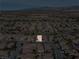 Aerial view of single-story house in a residential neighborhood at 5550 Carrara Pointe St, Pahrump, NV 89061