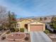 Single-story home with landscaped yard and mountain views at 5550 Carrara Pointe St, Pahrump, NV 89061