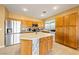 Kitchen boasts stainless steel appliances and island at 5550 Carrara Pointe St, Pahrump, NV 89061