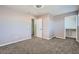 Spacious bedroom with neutral walls and plush carpeting at 5599 Valley Mill St, Las Vegas, NV 89148