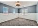 Charming bedroom with gray walls and carpet flooring at 5599 Valley Mill St, Las Vegas, NV 89148