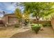 Landscaped backyard with gravel and mature trees at 5741 Pleasant Palms St, North Las Vegas, NV 89081