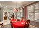 Elegant dining room features a chandelier and hardwood floors at 5741 Pleasant Palms St, North Las Vegas, NV 89081