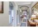 Bright and airy entryway with arched hallways and tiled flooring at 5741 Pleasant Palms St, North Las Vegas, NV 89081