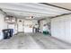 Bright garage with ample storage and overhead shelving at 5741 Pleasant Palms St, North Las Vegas, NV 89081