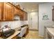 Functional laundry room with work surface and storage at 5741 Pleasant Palms St, North Las Vegas, NV 89081