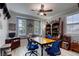 Home office with built-in shelving, window seat and wood desk at 5741 Pleasant Palms St, North Las Vegas, NV 89081