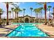 Sparkling community pool with lounge seating at 5741 Pleasant Palms St, North Las Vegas, NV 89081