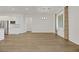 Open concept dining area with hardwood floors and a chandelier at 6364 Cambridge Creek Ct, Las Vegas, NV 89149