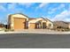 Single-story house with a large driveway and landscaped yard at 6364 Cambridge Creek Ct, Las Vegas, NV 89149