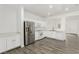 Bright kitchen with stainless steel appliances, white cabinets, and modern countertop finishes at 6382 Lonesome Lake St, Las Vegas, NV 89148