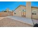 Large backyard with patio and gravel landscaping at 6560 Bush Clover Ln, Las Vegas, NV 89156