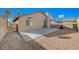 Backyard with patio, basketball hoop, and gravel at 6560 Bush Clover Ln, Las Vegas, NV 89156