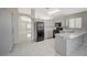 Modern kitchen with stainless steel appliances and island at 6560 Bush Clover Ln, Las Vegas, NV 89156