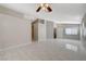 Spacious living room with tile floors and high ceilings at 6560 Bush Clover Ln, Las Vegas, NV 89156