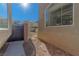 Private backyard access with gate and gravel pathway at 6607 Musette Ave, Las Vegas, NV 89139