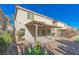 Covered patio with ceiling fans, adjacent to a spacious backyard at 6607 Musette Ave, Las Vegas, NV 89139