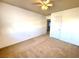 Large bedroom with ceiling fan and carpet flooring at 6607 Musette Ave, Las Vegas, NV 89139