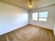 Well-lit bedroom featuring carpet and ceiling fan at 6607 Musette Ave, Las Vegas, NV 89139