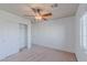 Bedroom with double closet and ceiling fan at 6607 Musette Ave, Las Vegas, NV 89139