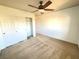 Bright bedroom featuring a large closet and ceiling fan at 6607 Musette Ave, Las Vegas, NV 89139