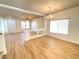 Bright dining room with hardwood floors and chandelier at 6607 Musette Ave, Las Vegas, NV 89139