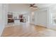 Open concept living room and kitchen with island at 6607 Musette Ave, Las Vegas, NV 89139