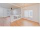 Light and bright living room with light wood floors and ceiling fan at 6607 Musette Ave, Las Vegas, NV 89139