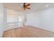 Light and bright living room with light wood floors and ceiling fan at 6607 Musette Ave, Las Vegas, NV 89139