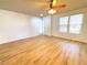 Bright living room with hardwood floors and ceiling fan at 6607 Musette Ave, Las Vegas, NV 89139