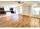 Open concept living room with a view of the kitchen at 6607 Musette Ave, Las Vegas, NV 89139