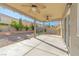 Large covered patio with ceiling fans and a view of the backyard at 6607 Musette Ave, Las Vegas, NV 89139