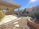 Covered patio with ceiling fan and artificial turf at 6607 Musette Ave, Las Vegas, NV 89139