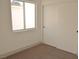 Bedroom with closet and window, carpeted floor at 7409 Flat Rock St, Las Vegas, NV 89131