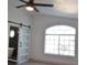 Bright bedroom with a large window and a barn door to the en-suite bathroom at 7409 Flat Rock St, Las Vegas, NV 89131