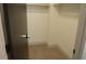 Spacious walk-in closet with carpeted floor at 7409 Flat Rock St, Las Vegas, NV 89131