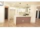 Modern kitchen with white cabinets and quartz countertops at 7409 Flat Rock St, Las Vegas, NV 89131